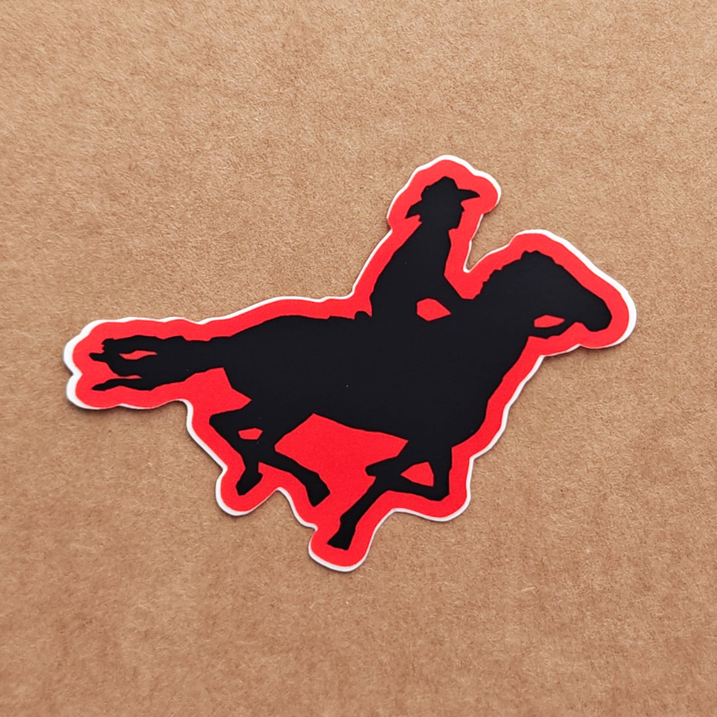 Cowboy on horseback - vinyl sticker